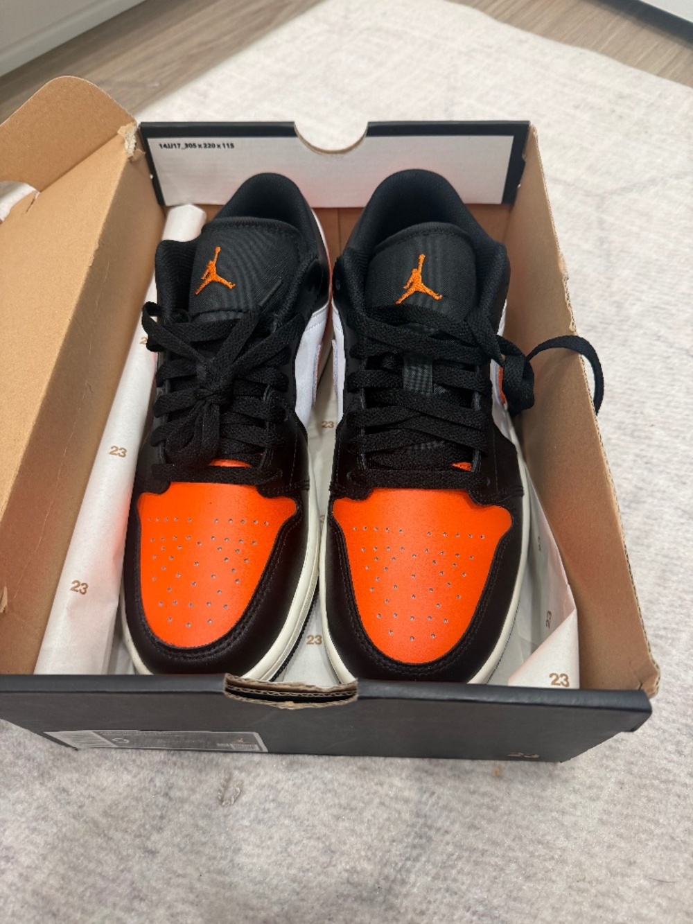 New in box, men’s Air Jordan 1 Low size 9